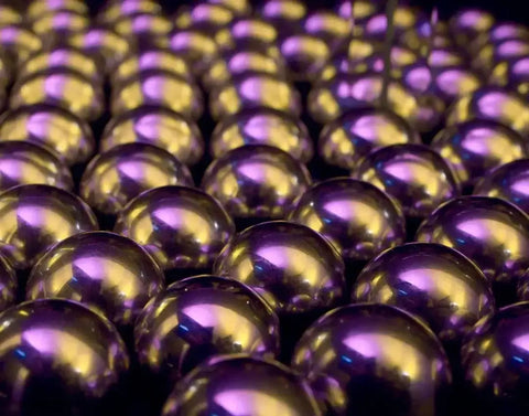 Essential Tips for Maintaining Ball & Roller Bearings - close-up of metallic ball bearings.