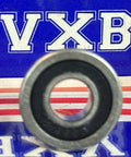 Front view of SF686-2RS Stainless Steel Flanged Bearing 6x13x5mm Sealed Miniature against blue VXB background.
