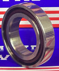 7008 Angular Contact ABEC-5 Spindle Bearing Ceramic 40x68x15, metal outer ring, close-up view against blue and red background