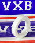 Full Ceramic Sealed Bearing 22x31x7mm ZrO2 on display against red and blue background