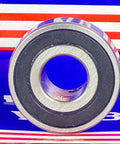 Front view of CSB204-12 Insert Ball Bearing with Set Screw Locking, Sealed Bearing, 3/4in Bore x 47mm OD, on blue background