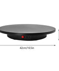 Motorized Rotating Display Stand With Remote 16.5Inch 360 Electric Spinning Photography Turntable For Jewelry Watches And Decor TopShelf UltraQuiet Rotation QuickSetup Control MaxWeight OverTwo Pounds Slick GlossBlack Base top view showing dimensions and controls.