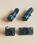 Top view of two black circular servo motor encoder plugs (10-pin) with matching panel-mount plates