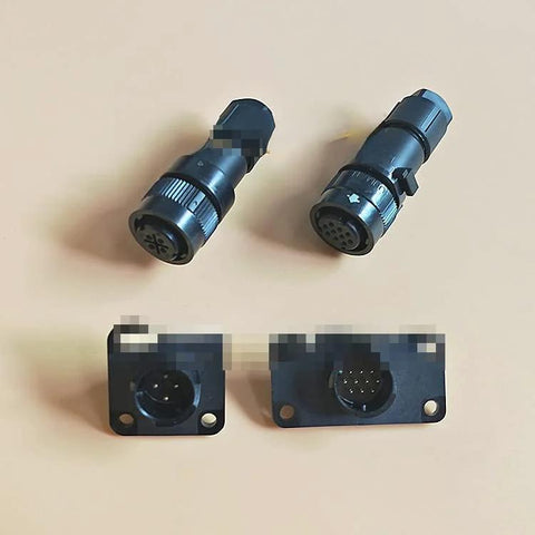 Top view of two black circular servo motor encoder plugs (10-pin) with matching panel-mount plates