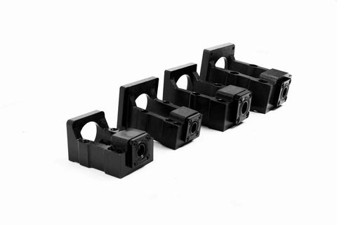 Four black BK10 fixed-end bearing mounts for 57mm Nema-23 stepper motors