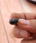 Close-up of 12 Pack Archery Field Points 100 And 125 Grain Screw In Arrow Tips with rubber O-ring, held between fingers