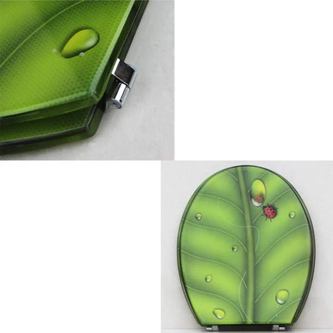 Heavy Duty Elongated Toilet Seat With Smooth Slow Close Lid And Rock Solid Metal Hinges Ergonomic Shape For Super Comfort Wear Resistant Coating Easy Install Fits Oval Toilets with leaf design and chrome hinge.