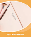Top Tier Stainless Steel R Shape Cotter Pins 8 Pack on a flat surface with makeup brushes and blush compact.