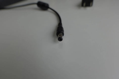 Close-up of a power connector on Universal E Bike Charger For Lectric And RAD Models AC Adapter with black cable.