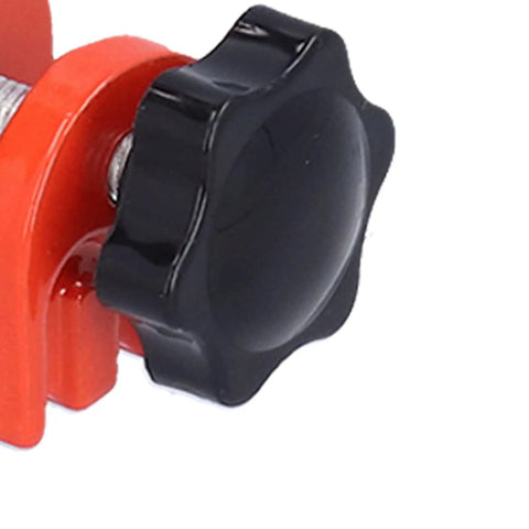 Close-up of Bad Ass Heavy Duty Straight Edge Clamp For Woodworking, featuring a black knob and orange body for secure gripping.