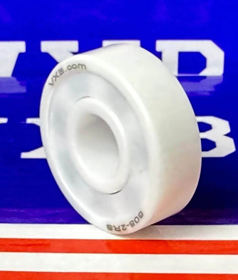 Close-up view of 8-Pack 608-2RS Full Ceramic Sealed Skate Bearings 8x22x7mm Miniature Bearings on a colorful background.
