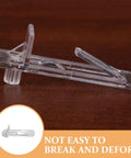 Plastic shelf peg with self-locking clip for 15-16mm wood boards, "30 Pieces Plastic Shelf Pegs For Cabinets And Shelves Self Locking Clips For 15mm To 16mm Wood Boards Easy Install Built To Last Deformation Resistant Shelf Supports For Kitchen Bookcase And Furniture" resting on wood surface, "not easy to break and deform" message.
