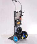 Huge 1200 Watt Electric Stair Climbing Hand Truck With 500 Kg Heavy Load Capacity And 48 Volt Battery, showcasing sturdy design with rubber tires.