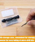 Pin Vise Hand Drill Set With 25 Micro Twist Drill Bits 0.5 To 3.0 Millimeter, shown with storage case and tweezers on wood surface