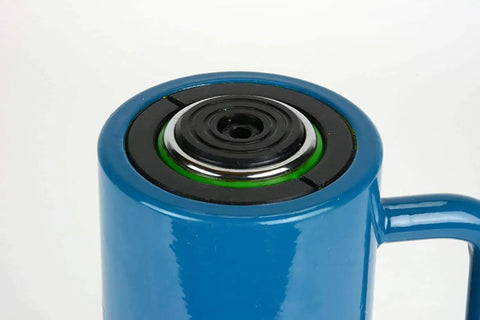 Top view of Built Tough Heavy Duty 20 Ton Hydraulic Cylinder With Six Inch Stroke Single Acting Ram Pumping Out Ten Thousand Psi.