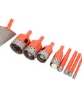 Solid 8 Piece Hole Saw Kit With Porous Vacuum Brazed Design For Tile Ceramic Glass Granite Marble Drilling Sizes 6 To 35mm Plus 2 Inch Chamfer Bit Tool set on white background