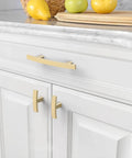 Super Dope Brushed Gold Cabinet Pulls For Kitchen And Bathroom Drawers 3 Inch Hole Centers Smooth Handle Set 10 Pack on white cabinets.