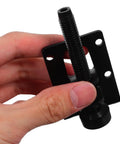 Close-up of a hand holding Four Piece Adjustable Furniture Leveling Feet With Sidmount Design, Heavy Duty PVC and Steel support leg