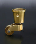 Heavy Duty Solid Brass Caster Wheels Set Of 4 With Mounting Screws Vintage Antique Round Cup Design showing a single caster wheel detail.