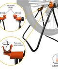 Adjustable Folding Bike Stand For 20 To 29 Inch Bikes Floor Mounted Alloy Steel Rack That Keeps Your Ride Scratch Free shown in use