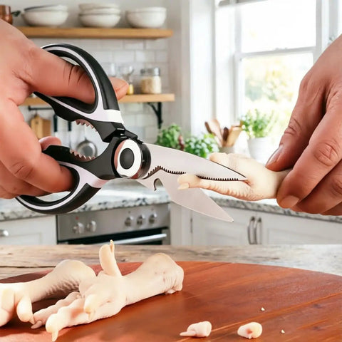 Rugged Kitchen Scissors For Everyday Cooking Ultra Sharp Stainless Steel Meat Shears For Spatchcocking Chicken Poultry Fish And Herbs Dishwasher Safe Multi Purpose Scissors With Ergonomic Comfort Grip And Built In Nutcracker Bottle Opener cutting raw chicken on a wooden board