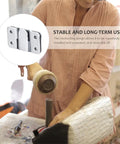 Gonna Look Awesome With These Rock Solid 16 Pair Stainless Steel Interlocking Picture Hooks Heavy Duty Mirror Hangers For Wall Art And Shelves Super Easy Zero Hassle Install, showing interlocking design with a hammer.