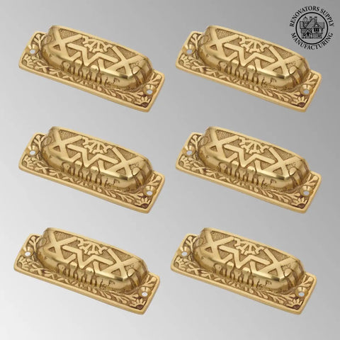 Rock Solid Cast Brass Azteca Cabinet Cup Pulls With Tough Scratch Resistant Finish Durable Vintage Kitchen Drawer Hardware Pack Of Six displayed on a grey background.