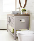 Modern bathroom setup featuring a cabinet with square matte black cabinet knobs about an inch and a quarter wide for kitchen cabinets.