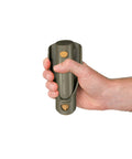 Hand holding Pocket Trowel For Backpacking And Camping With Retractable Handle And Durable Glass Reinforced Nylon 66, ultra compact.