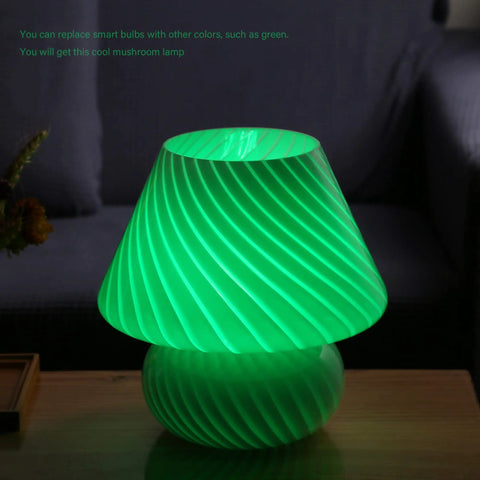 Swirl Mushroom Lamp With Vintage Striped Murano Glass glowing green, soft warm white LED, on desk