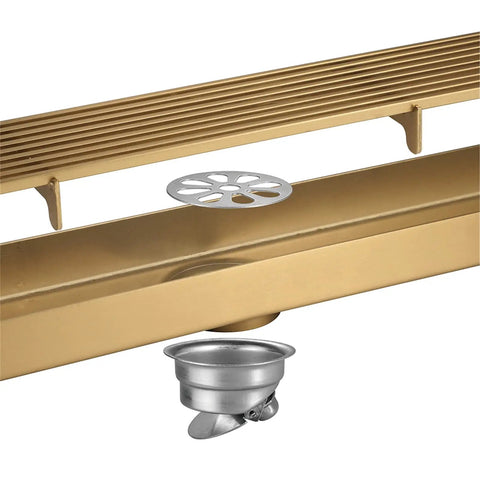 Top Shelf Slick Linear Shower Drain Stainless Steel Rectangle Floor Drain With Removable Grate Hair Catcher Bathroom High Flow Zero Fuss Easy Clean Gray Or Brushed Gold close-up of brushed gold drain and filter.
