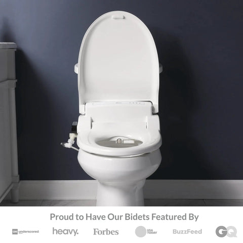 Level Up Your Restroom Game With This Hot Selling Heated Bidet Toilet Seat with remote control on a toilet.