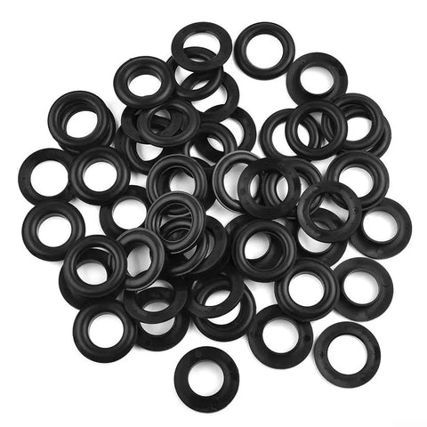 Badass Plastic Eyelets Hand Press Kit Adjustable Resin Grommets Slick Rust Proof Reinforcement Fasteners No Sweat Setup For Camping And Home Projects 50 Pack Black Heavy Duty showing a pile of black resin eyelets.