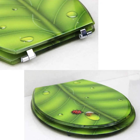 Heavy Duty Elongated Toilet Seat With Smooth Slow Close Lid And Rock Solid Metal Hinges Ergonomic Shape For Super Comfort Wear Resistant Coating Easy Install Fits Oval Toilets, green leaf design with ladybug.