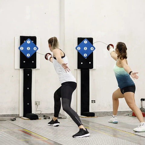 Two athletes practicing with 13 Inch Rubber Fencing Target For Saber Foil And Epee Training Self Practice Indoor Outdoor Use Thick Durable Rubber Safe Smooth Surface For Realistic Hits And Pro Skill Boost.