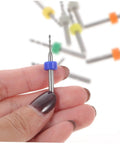 Person holding a drill bit from the 30Pcs PCB Drill Bit Set for Jewelry Engraving and Circuit Boards, Tungsten Micro Drill Bits for DIY Projects and Precision Work, Easy To Use Pro Kit for Beginners and Weekend Warriors