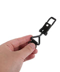 Heavy Duty Industrial Toggle Latches With Self Locking Quick Release Draw Mechanism For Secure Clamping And Matte Black Iron Build To Take Heavy Rough Use Daily held in hand.