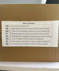 Safety warning label on a cardboard box with multiple language instructions near Super Handy Automatic Screw Feeder With Balancer For Round Heads Cross Recesses Supports 1.9-4.3mm Screws Up To 10mm Length Huge 300 Count Bin Boosts Assembly Workflow And Cuts Work Time Way Down.