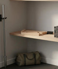 Barbell Plate Change Jack Portable Weightlifting Gear on a shelf with gym accessories