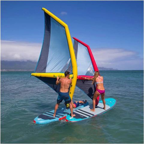 Two people using Inflatable Sail For Wind Wing Foiling And Kitesurfing, 4.2 Square Meters Windsurf Wing Foil on a surfboard in the ocean.