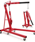 Heavy Duty Folding Hydraulic Engine Hoist Two Ton Portable Garage Cherry Picker with casters and boom arm.