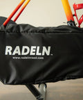 Indoor Bike Trainer Chain Cover And Drivetrain Guard padded black cover on a bike chainstay, fits most drivetrains