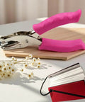 1/4 Inch Pink Handheld Circle Hole Punch For Crafting with flowers and card samples on table