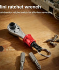 Grab And Go Portable Quarter Inch Hex End Mini Ratchet Wrench Set with Quick Release Magnetic Bit Driver shown on a wooden surface