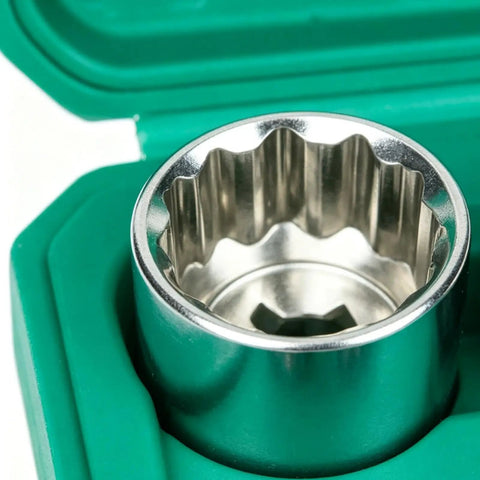 Heavy Duty 12 Point Socket Set Mechanic Tool Kit With Storage Case Adapter. 12-point steel socket in green case, close-up.