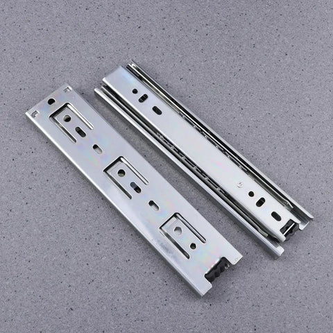 Two Pack Heavy Duty Steel Ball Bearing Drawer Slides With Buttery Smooth Gliding Action built for kitchen cabinets on gray background.