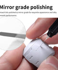 Close-up of hand using precision broach bit for mirror grade polishing on a model part in detailed scribing.