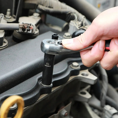Using 1/4 Inch Drive Master Impact Socket Set, 50-Piece, 6-Point SAE and Metric, From 5/32 to 9/16 Inch and 4mm to 15mm on engine