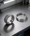 Upper And Lower Steering Bearings Set For INOKIM OX And OXO Electric Scooters Alloy Steel Replacement Parts on a workbench