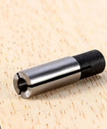 Rock Solid CNC Router Tool Adapter ER Collet Shank Reducer 6Mm To 3.175Mm on wooden surface showing precision steel design.